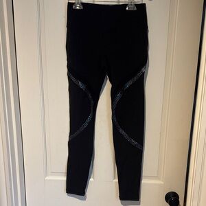 Sleek Black Leggings with Patterned Accents